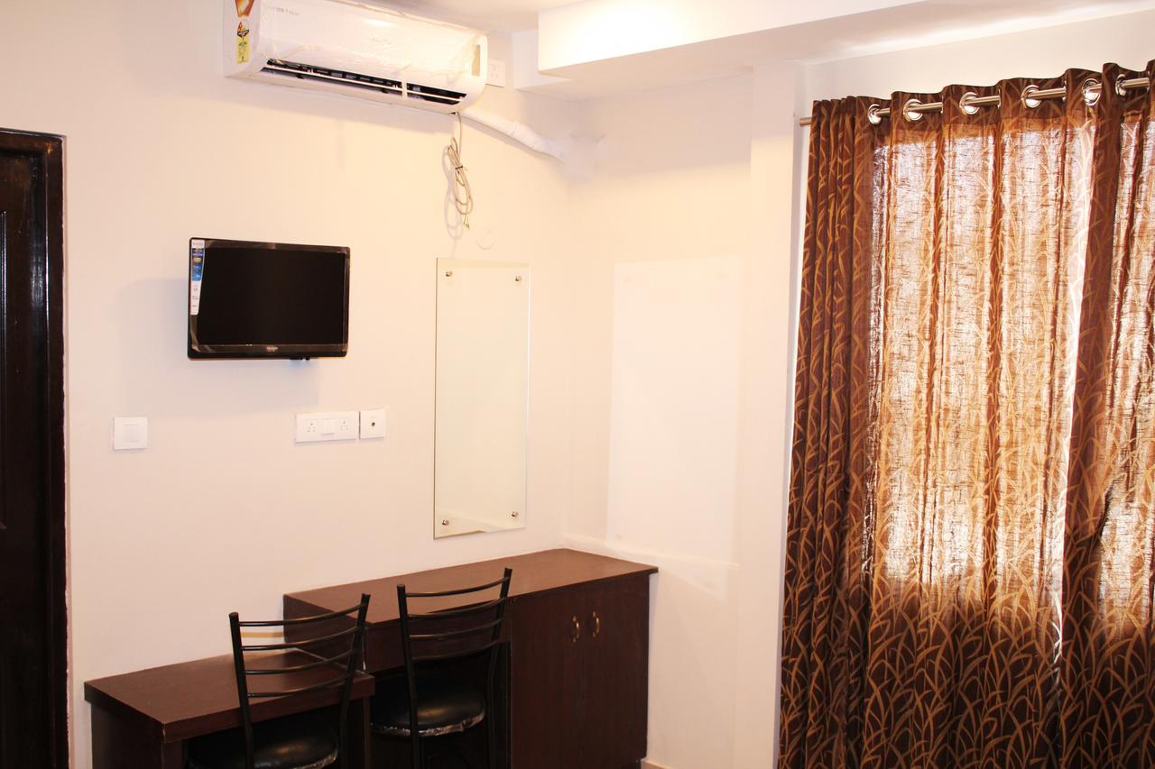 Collection O 8267 Galaxy Inn Kochi Buitenkant foto